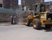 رفع تراكمات القمامة وصيانة أعمدة الإنارة بحى ثان المحلة بالغربية.. صور