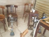 غلق مقاهى تفتح بالمخالفة للقرار الوزارى وتقدم الشيشة فى الهرم.. صور