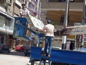 إزالة الإعلانات غير المرخصة بحى ثان الزقازيق.. صور