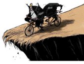 كاريكاتير صحيفة سعودية.. المليشيات المسلحة تجر العراق إلى الهاوية