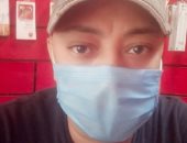 "عمرو  " يشارك بصورة له بالكمامة فى العمل التزاما بالإجراءات الوقائية