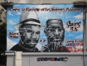 صور ..تخريب جدارية لجورج فلويد فى باريس بكتابة عبارات عنصرية