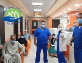صور.. مستشفى إسنا للحجر الصحى تعلن خروج 32 حالة بعد شفائهم من كورونا
