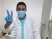 الجيش الأبيض.. إبراهيم فنى أشعة بمستشفى الغنايم فى مواجهة كورونا