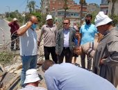 إصلاح هبوط أرضى بطريق 801 أمام مدخل عزبة العريضة بدمياط.. صور 