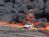 أوناش المرور ترفع آثار السيارات المحترقة إثر حريق خط بترول طريق الإسماعيلية