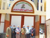 متطوعون يساعدون مرضى كورونا فى أسوان.. مبادرة "بيت العيلة" توزع 5 آلاف كمامة على المواطنين بالمجان.. وممرضون يقدمون العلاج لحالات العزل المنزلى.. ومفتش بالأوقاف ينشر نصائح الوقاية بالكنيسة.. صور