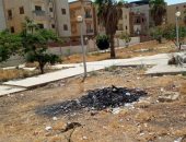  شكوى من تراكم وحرق القمامة فى الحى الـ 11 بالشيخ زايد