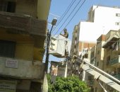 صور.. حملة لصيانة اعمدة الإنارة وكابلات الكهرباء بشوارع طنطا