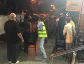 محافظة الجيزة ترصد جراج مخالفة بالدقى بعد تحويله لكافيه.. صور