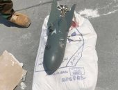 أول صور لضبط طائرة مسيرة محملة بقنبلة شديدة الانفجار فوق مبنى ببغداد