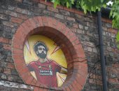 محمد صلاح يزين شوارع ليفربول احتفالا بالتتويج بالدورى الإنجليزي