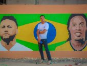 "محمد" اكتشف موهبته فى رسم الجرافيتى بالحب.. اعرف ازاى؟