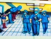 "محمد" يخلد بطولات الجيش الأبيض عبر جرافيتى على جدران شوارع دمياط