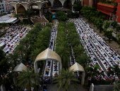 صور.. مسلمو تايلاند يؤدون صلاة عيد الأضحى بالكمامات