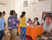 كنيسة العذراء مريم بإسنا تخصص غرفة لتسهيل عملية الانتخاب على الناخبين