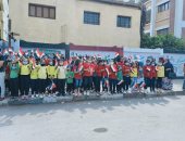 فيديو وصور.. الطلاب يدعمون انتخابات مجلس الشيوخ برفع الأعلام أمام لجان الدقى