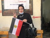  زوجة أول شهيد فى أحداث فض رابعة تدلى بصوتها فى الانتخابات