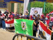 طلاب الجامعة يدعون للمشاركة فى انتخابات الشيوخ أمام لجان الدقى..