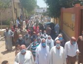 صور.. حشود الناخبين تتحدى ارتفاع درجة الحرارة بالقاهرة