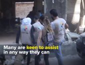 اللاجئون فى لبنان يشاركون فى تنظيف آثار انفجار مرفأ بيروت (فيديو)