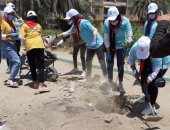 صور.. مبادرة جديدة للنظافة والتشجير ودهان البلدورات بمنطقة كيما بأسوان