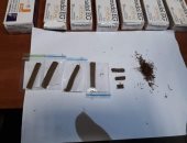 جمارك مطار القاهرة تضبط محاولة تهريب أقراص ترامادول وقطع حشيش