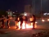 انتشار أمنى مكثف فى محيط البرلمان العراقى بالبصرة بعد محاولة إحراقه.. فيديو