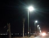 صيانة كابلات وأعمدة الإنارة بطريق مرسى مطروح الدولى ..  صور 