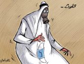 كاريكاتير صحيفة كويتية.. التلوث وكورونا يهددان العالم
