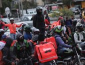 عمال التوصيل فى كولومبيا يحتجون للمطالبة بتحسين الأجور وظروف العمل.. صور