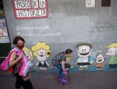 رسومات المبدع "كينو" مبتكر قصة "مافالدا" تزين شوارع الأرجنتين.. ألبوم صور