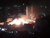 صور.. حريق بمقبرة ومسجد الصحابة في درنة الليبية