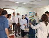 نائب محافظ الجيزة تتفقد أعمال التصالح بمخالفات البناء بمشاركة شباب البرنامج الرئاسى