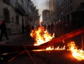 صور.. مظاهرات تشيلى تتحول إلى حرب شوارع مع الشرطة