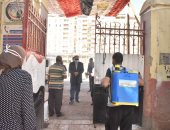 حملة مكبرة لتعقيم مقرات ولجان انتخابات مجلس النواب بأسيوط.. صور