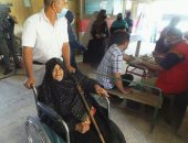 15 صورة ترصد إقبال ذوى الاحتياجات الخاصة وكبار السن فى اليوم الأول للانتخابات