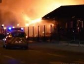 فرق الدفاع المدني الفرنسية تحاول السيطرة على حريق "لوهافر".. صور