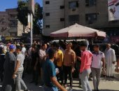 شباب الوراق وأوسيم يشاركون فى تنظيم العملية الانتخابية للنواب.. صور 