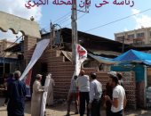 صور.. حملة لإزالة بنرات مرشحى النواب ورفع إشغالات المحلات بالمحلة