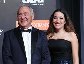 نجيب وسميح ساويرس ويسرا وآيتن عامر على السجادة الحمراء فى ختام "الجونة"