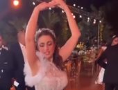 درة ترقص باليه على أغنية Je t'aime خلال حفل زفافها.. فيديو 