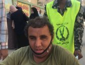 محمد فاروق مواطن لم تمنعه إعاقته من المشاركة فى انتخابات النواب بالعريش..صور