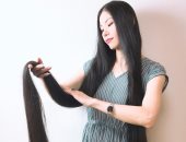 يابانية لم تقص شعرها 15 عاما ليصل إلى متر و82 سم.. صور
