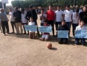 طلاب مدرسة بالقلوبية يشاركون بمباردة "لا للتعصب" قبل مباراة الأهلى والزمالك