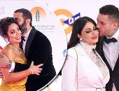 قبلات على الريد كاربت.. نجوم ونصفهم الحلو على السجادة الحمراء بافتتاح مهرجان القاهرة