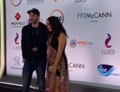 محمد فراج يظهر بدون لحية مع بسنت شوقي علي السجادة الحمراء لفيلم "أنيما" بمهرجان القاهرة