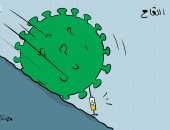 لقاح كورونا يلاحق الفيروس التاجى للقضاء عليه فى كاريكاتير كويتى