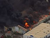 لقطات جوية لحريق هائل بمنطقة صناعية قرب ميناء بريسبن فى أستراليا.. فيديو