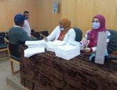 "صحة أسوان" تنظم قافلة للتسجيل فى منظومة التأمين الصحى الشامل.. صور